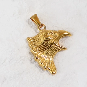 Detailed macro view of 24K gold-plated eagle head pendant charm for DIY jewelry making