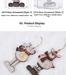 Detail of laser-cut wooden reindeer Christmas tree ornaments with red scarves and jute ropes