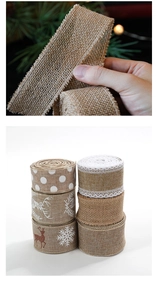 Detail of natural jute burlap ribbons with Christmas elk and snowflake patterns for decor
