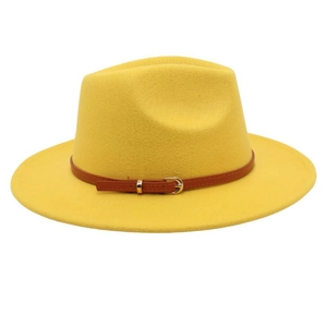 Detailed close-up of yellow wool felt fedora with brown leather belt buckle band
