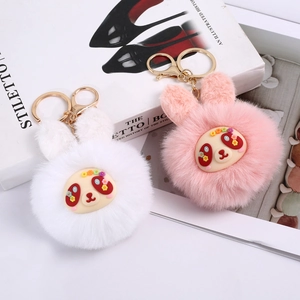 Cute plush rabbit ear keychain charms in white and pink with gold metal lobster clasp