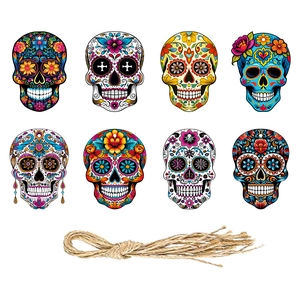 Set of 8 colorful Day of the Dead sugar skull hanging tags with floral patterns and twine