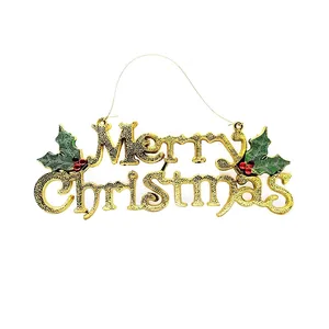 Golden Merry Christmas sign with holly berries and leaves for Christmas tree decoration