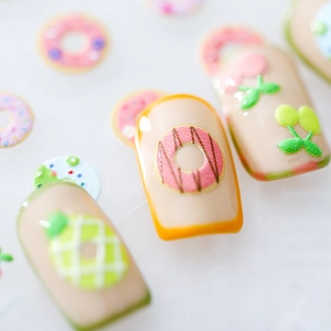 5D embossed donut and fruit nail art stickers with 3D texture on neutral base