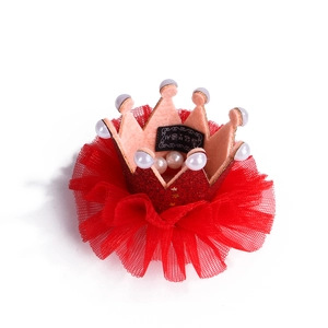 Detail of red pet crown headpiece with lace mesh and white pearl embellishments