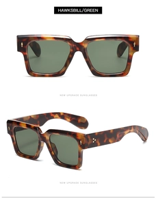 Detail view of retro square tortoise sunglasses with green lenses and gold metal studs