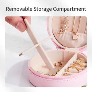 Pink round PU leather jewelry box with removable dividers and soft velvet interior