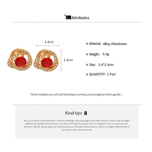 Detail view of red rhinestone flower earrings with gold alloy finish and 1.4cm dimensions
