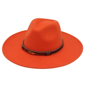Detail of orange wool felt fedora with beaded leather band and golden feather charm