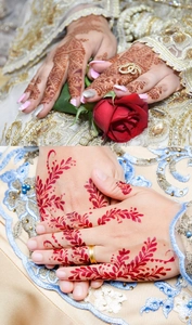 Detail of reddish-brown waterproof henna tattoo stickers with intricate floral lace patterns