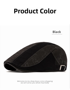 Close-up of black cotton newsboy cap featuring side metal buckle and twill texture