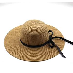 Summer wide brim straw sun hat with black ribbon bow, foldable vacation style for women