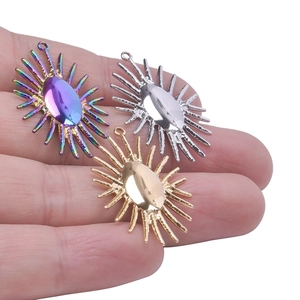Handheld 18k gold plated sun and evil eye pendants in gold, silver and rainbow colors