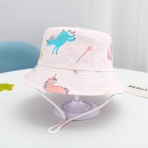 Detail of pink kids bucket hat with unicorn print and adjustable elastic chin strap