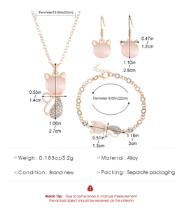 Detailed dimensions of cat-shaped opal jewelry set including necklace and earrings