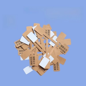 Brown and white adhesive jewelry tag for rings with non-removable security text