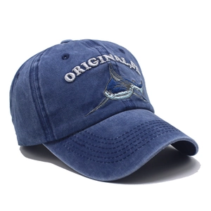Washed navy blue baseball cap with original embroidered marlin fish and curved brim