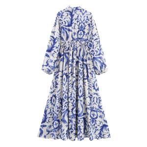 Bohemian long sleeve maxi shirt dress with blue and white abstract print and smocked waist