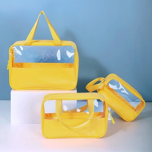 Three-piece clear PVC and yellow PU leather toiletry bag set with zipper and handles