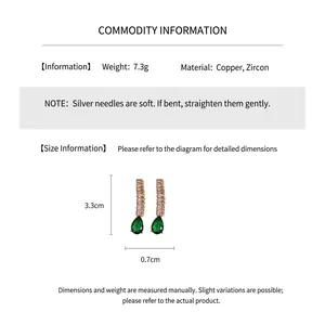 Detailed product specifications for teardrop zircon earrings featuring dimensions and material