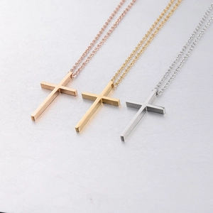Polished stainless steel cross necklaces in rose gold, gold, and silver finishes