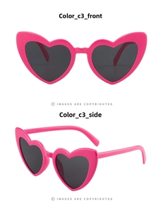 Vista frontale e laterale di occhiali da sole trendy a forma di cuore rosa acceso