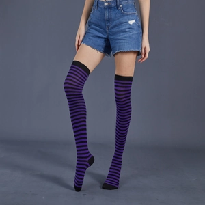 Detail of purple and black striped over-knee high socks with fine knit texture