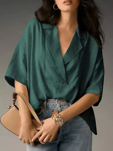 Deep green satin short sleeve blouse with V-neck and dropped shoulders for women