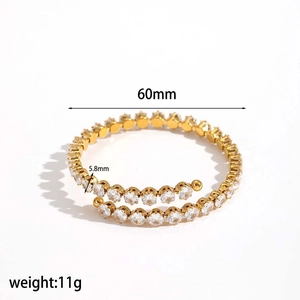 Gold plated stainless steel wrap bracelet with clear zircons in 60mm diameter