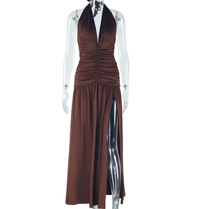 Detail of brown halter neck dress showing ruched waist and high side slit detail