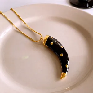 Ethnic style black horn pendant necklace with gold dots and fine chain for women