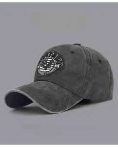 Macro detail of charcoal grey vintage baseball cap showing military patch and fabric texture