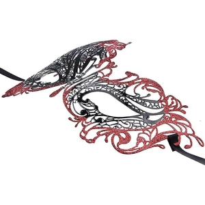 Close-up of red and black glitter masquerade mask with crystal detail and satin ribbon