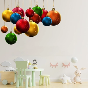 Detail of 3D colorful Christmas ball wall decals with water droplets in a cozy nursery