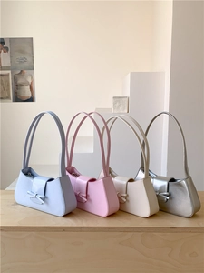 Chic baguette shoulder bags with bows in light blue, pink, cream, and silver colors
