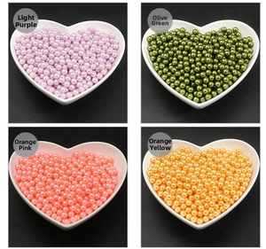 Colorful 3-10mm pearl beads in light purple, green, peach, and orange for DIY crafts