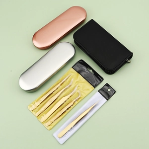 Professional gold eyelash tweezers set with rose gold and silver metal storage cases