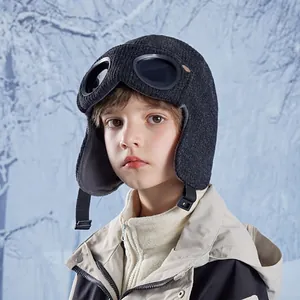 Winter children's pilot hat with fleece lining, goggles, and adjustable ear flaps
