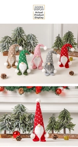 Detail view of five assorted knit Christmas gnomes with heart patterns and long white beards