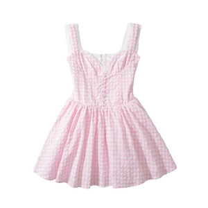 Detailed view of pink plaid dress with white lace trim and decorative front buttons