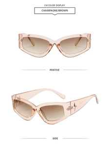 Detail of champagne cat-eye sunglasses with metal star accent and brown gradient lenses