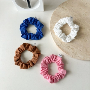 Colorful oversized cotton hair scrunchies set in blue white brown and pink colors