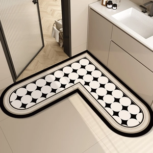 L-shaped non-slip bathroom mat with black and white geometric patterns for corners