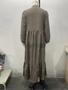 Detail view of vintage geometric print maxi dress with ruffles and long sleeves