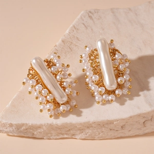 Baroque irregular pearl stud earrings with gold plating and vintage French design style