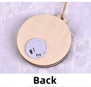 Back view of wooden Christmas elk ornament showing battery compartment and LED switch