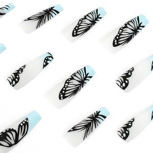 Blue and white gradient ballet press-on nails with delicate black butterfly wing patterns