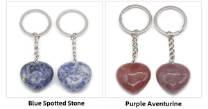 Detail view of heart-shaped blue spot and purple aventurine stone keychains