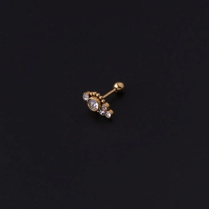 Detailed view of gold stainless steel stud earring with sparkling white rhinestones