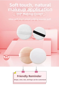 Close-up of soft crystal velvet round powder puffs with ribbons for makeup setting